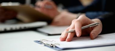 Hand Of Businessman Signing Document With Pen 841152706